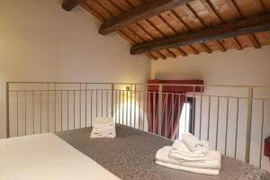 Postel nebo postele na pokoji v ubytování Honey Rooms Ferrara