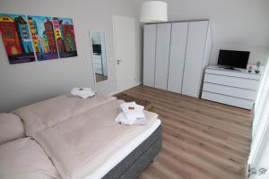 TV/Unterhaltungsangebot in der Unterkunft Ostsee - Reetdachhaus Nr 9 "Emma" im Strand Resort