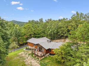 an overhead view of a house in the woods at Honeybear Hideaways - Luxurious Modern 7BR Cabin with Indoor Pool, Game Room, Hot Tub & Fireplace in Sevierville
