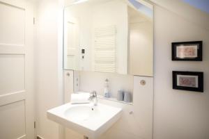 Ein Badezimmer in der Unterkunft Ostsee - Appartement Nr 19 "Sonnenzauber" im Strand Resort
