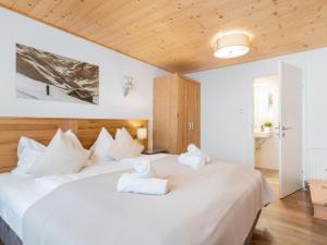 Posteľ alebo postele v izbe v ubytovaní Alpensteinbock Saalbach