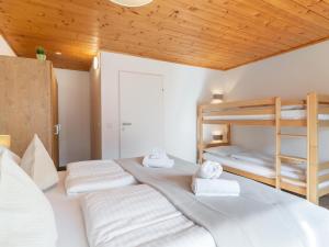 Posteľ alebo postele v izbe v ubytovaní Alpensteinbock Saalbach