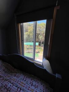 Postel nebo postele na pokoji v ubytování Tiny house