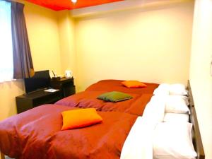 Giường trong phòng chung tại PREMIUM TOJI - Vacation STAY 28842v