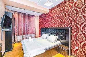 Ένα ή περισσότερα κρεβάτια σε δωμάτιο στο Delux apartment near winter park +35 φωτογραφίες