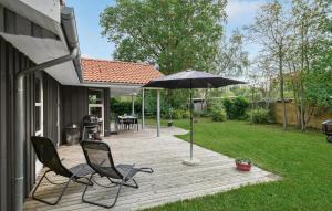 Zahrada ubytování Holiday Home Solvænget Væggerløse X + 16 fotografií