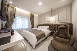 Postel nebo postele na pokoji v ubytování Hotel MARIA