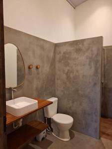 Koupelna v ubytování Casa Ninho + 9 fotografií