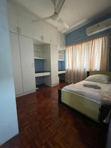 Ένα ή περισσότερα κρεβάτια σε δωμάτιο στο Condo in kuala lumpur