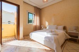 Postel nebo postele na pokoji v ubytování Maison avec Piscine Proche Plage + 36 fotografií