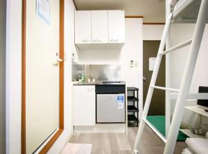 Η κουζίνα ή μικρή κουζίνα στο Holiday Anytel Shinjuku#2