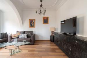 Μια τηλεόραση ή/και κέντρο ψυχαγωγίας στο Appartement Cosy Proche du Stade