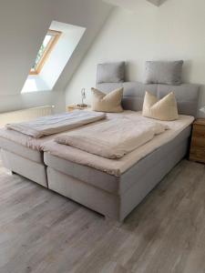 Ένα ή περισσότερα κρεβάτια σε δωμάτιο στο Ferienhaus Eibe am Jabeler See 7a