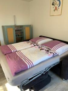 Ένα ή περισσότερα κρεβάτια σε δωμάτιο στο Ferienhaus Eibe am Jabeler See 7a +4 φωτογραφίες