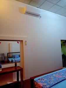 Voodi või voodid majutusasutuse Turtle Island Cabana toas