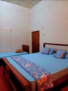 Voodi või voodid majutusasutuse Turtle Island Cabana toas