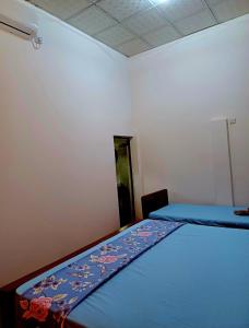 Voodi või voodid majutusasutuse Turtle Island Cabana toas