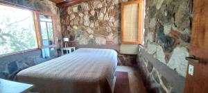 En eller flere senge i et værelse på Casa FUJI + 100 billeder