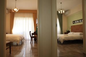 Postel nebo postele na pokoji v ubytování Anice Guesthouse