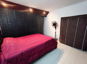 En eller flere senge i et værelse på Departamento luna