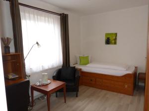 Postel nebo postele na pokoji v ubytování Hotel Brandaris