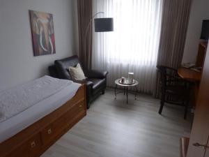 Postel nebo postele na pokoji v ubytování Hotel Brandaris