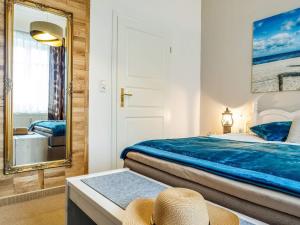 Postel nebo postele na pokoji v ubytování Villa Balticum - Ferienwohnung 2
