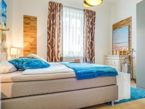 Postel nebo postele na pokoji v ubytování Villa Balticum - Ferienwohnung 2
