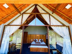 Postel nebo postele na pokoji v ubytování Ella Lovers View Cabins