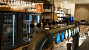 a bar with a row of blue tags at Vayamundo Houffalize in Houffalize