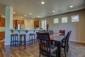 a kitchen and dining room with a table and chairs at Quinn Creek in Bend