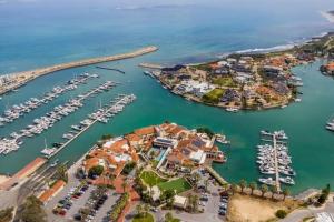 an aerial view of a harbor with boats in the water at Your comfortable getaway home in Clarkson