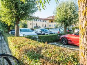 a group of cars parked in a parking lot at Ostseeresidenz - Whg 17 in Groß Kirr