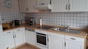 Kuchyň nebo kuchyňský kout v ubytování Ferienwohnung Braun