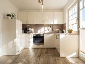 Kuchyň nebo kuchyňský kout v ubytování Ferienhaus "Zum Achterknoten"