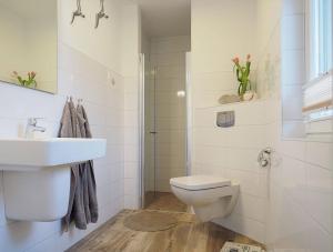 Koupelna v ubytování Ferienhaus "Zum Achterknoten"