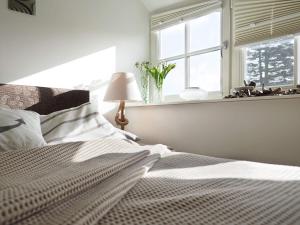 Postel nebo postele na pokoji v ubytování Ferienhaus "Zum Achterknoten" + 9 fotografií