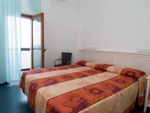 Säng eller sängar i ett rum på Hotel Lido Torre Egnazia