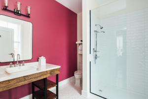 a bathroom with a sink and a shower at The Painted Lady in Birmingham