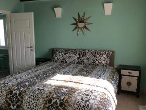 Postel nebo postele na pokoji v ubytování Bellavista Attic Apartment