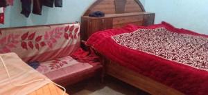 Katil atau katil-katil dalam bilik di Vinay homestay