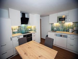 Kuchyň nebo kuchyňský kout v ubytování Apartment in Stuhlfelden near Ski Lift