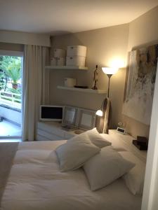 Cama o camas de una habitación en Minerva Beach