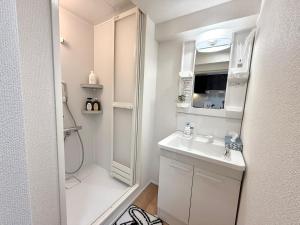 Koupelna v ubytování Shinjuku Wasedaハウス T3 + 25 fotografií