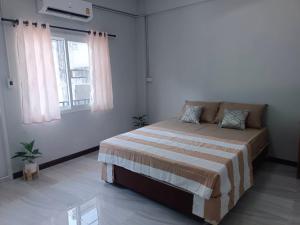 Cama o camas de una habitación en The Little home 11 fotos más