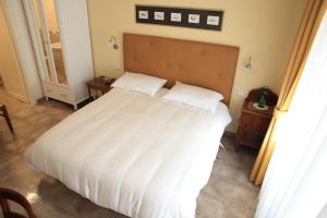 Postel nebo postele na pokoji v ubytování Anice Guesthouse