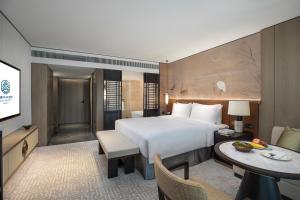 Katil atau katil-katil dalam bilik di Xiamen Aqua Resort