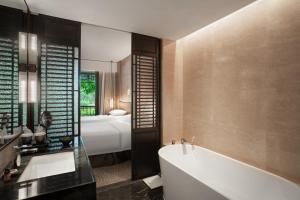 Katil atau katil-katil dalam bilik di Xiamen Aqua Resort
