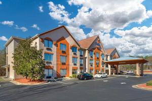 a rendering of a hotel with a parking lot at Comfort Suites Northside Hospital Gwinnett in Lawrenceville