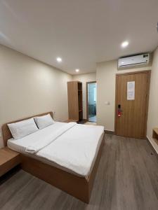 Ένα ή περισσότερα κρεβάτια σε δωμάτιο στο D2-Hh92